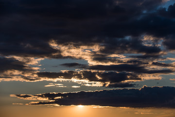 Sunset sky with rain clouds