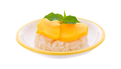 Thai style tropical dessert, glutinous rice eat with mangoes