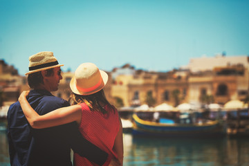 Fototapeta na wymiar happy tourist couple travel in Malta, Europe