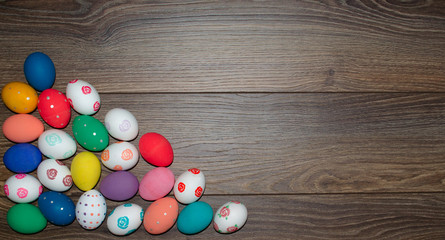 Easter eggs hand painted on wooden background. Happy Easter
