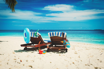 Two beach chairs on tropical vacation