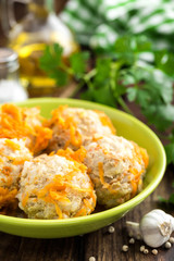 Chicken meatballs with rice braised in vegetables