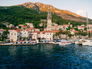 The old town of Perast on the shore of Kotor Bay, Montenegro. The ancient architecture of the Adriatic and the Balkans. Fishermen's cities of Europe.