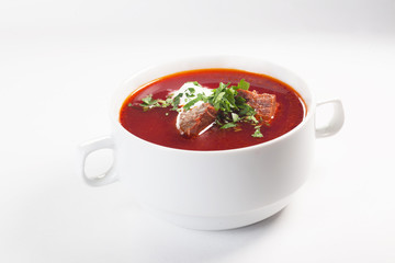 Borscht in soup tureen isolated on white background restaurant, bowl with handles, for menu