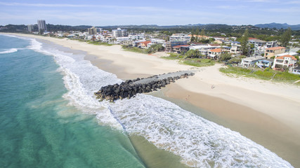 Aerial view of Gold Coast Palm Beach and tidal break facing south