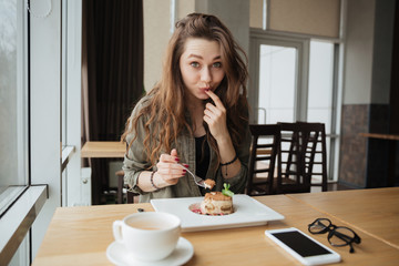 Woman enjoying cake