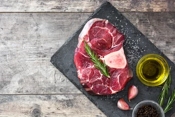 Crédence de cuisine en verre imprimé Viande Raw meat and ingredients on wooden background  