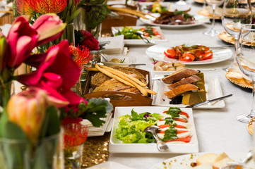 Bread and cold snacks on the table