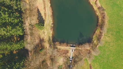 Top view of a wooden bridge at the Eutersee. The Eutersee is a little lake in south Hessia, Germany.
