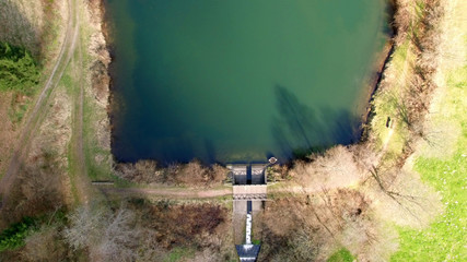 Top view of a wooden bridge at the Eutersee. The Eutersee is a little lake in south Hessia, Germany.
