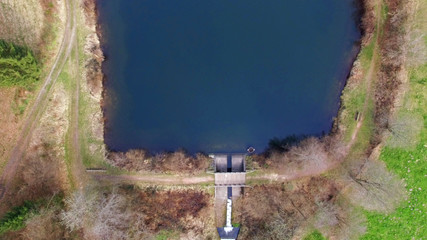 Top view of a wooden bridge at the Eutersee. The Eutersee is a little lake in south Hessia, Germany.
