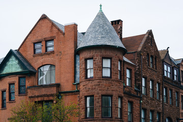 Fototapeta na wymiar Historic buildings along Charles Street in Mount Vernon, Baltimore, Maryland.