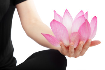 woman practicing yoga with lotus flower isolated on white background.