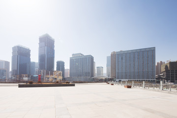 empty floor with modern cityscape and skyline