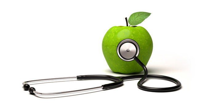 Healthy concept. Stethoscope and green apple isolated on white background.