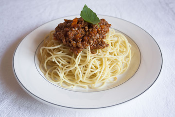 Spaghetti Bolognese on the white plate. Italian food