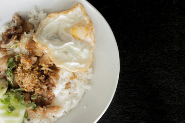 Pork stir-fried with garlic and peppercorns with egg.