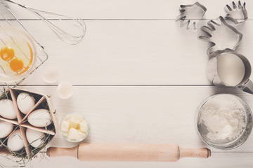 Baking ingredients on white rustic wood background, copy space