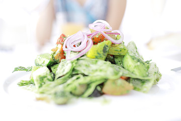 Salad in a cafe diet girl