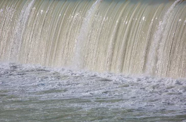 Crédence de cuisine en verre imprimé Barrage Strong stream of water at the hydroelectric dam