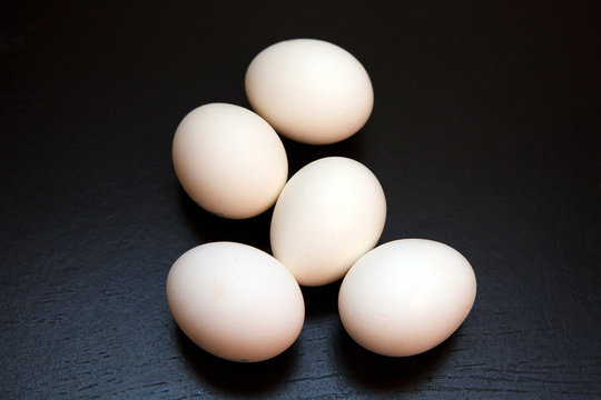 White chicken eggs. Natural rustic food that gave birth to birds. Easter still life egg clean.