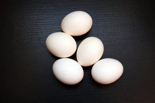 White chicken raw eggs. Natural rustic food that gave birth to birds. Easter still life egg clean.