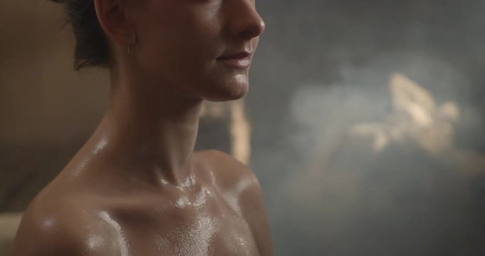 Geothermal spa. Woman relaxing in thermal baths. Girl is enjoying the rest After fitness. Concept of a healthy lifestyle