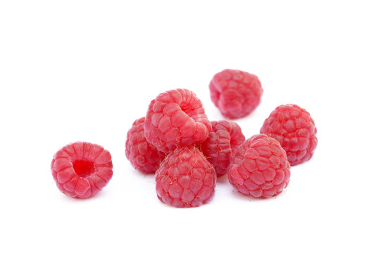 Sweet ripe raspberries isolated on white background
