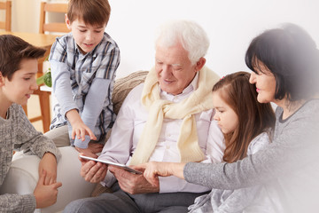 Grandpa using tablet