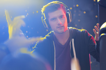 Charismatic dj wearing headphones