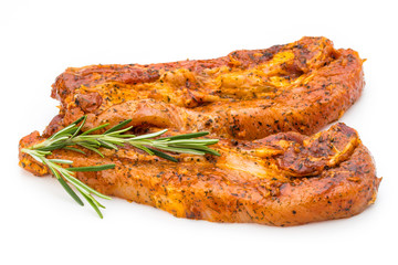 Spicy marinated spare ribs barbecued on the white background.