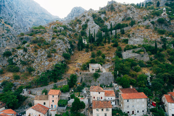 Fototapeta na wymiar The Old Town of Kotor. Kotor Wall. The wall around the city on the mountain. Montenegro