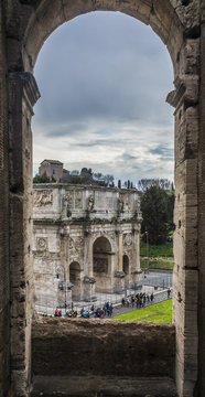 Piazza del Colosseo, Rome, Lazio. The Arch of Constantine in the frame
