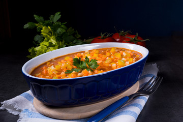 fish with vegetables in tomato sauce