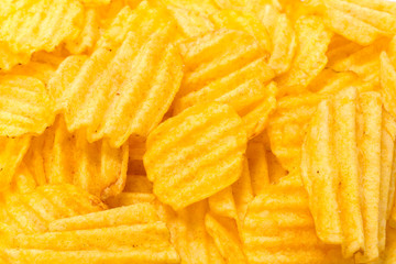 yellow potato chips isolated on white