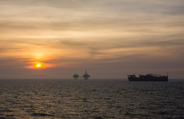 Oil Field In Sunset