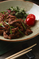 Beef stroganoff in Japanese in sesame with soy sauce and onions.