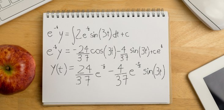 Composite image of calculations against black background