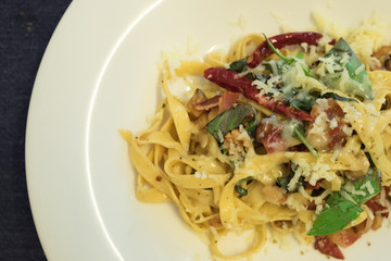 Fettuccine bacon fried basil with parmesan