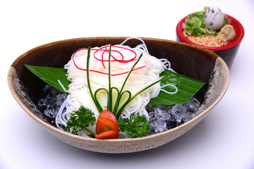 Hiyashi Somen , Japanese chilled noodles served with dipping sauce , isolated on white background (with Clipping Path)