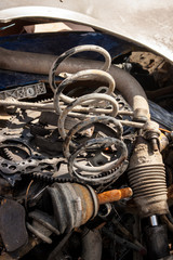 Fototapeta na wymiar Heap of broken auto parts
