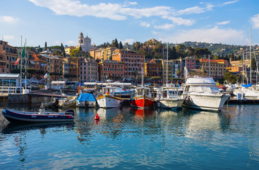 Fototapeta na wymiar SANTA MARGHERITA LIGURE, ITALY, APRIL 8, 2017 - View of Santa Margherita Ligure, Genoa, from the harbor, touristic place in Riviera Ligure, mediterranean sea, Italy