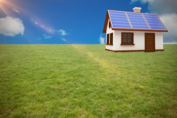 Composite image of 3d illustration of house with solar panels