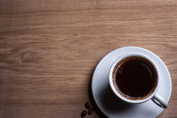 Coffee cup on wooden table