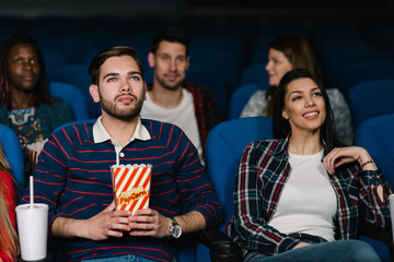 Young couple on a date at the movies