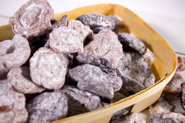 Closeup of dried candied fruits and vegetables in basket