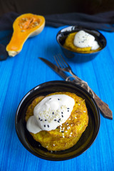 pumpkin pancakes on a blue wooden background