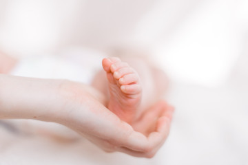 Obraz na płótnie Canvas New born baby feet