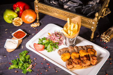 A shish kebab of allsorts from chicken, kebab from mutton, a shish kebab from veal
