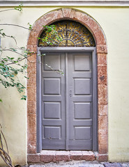 house entrance with arched door